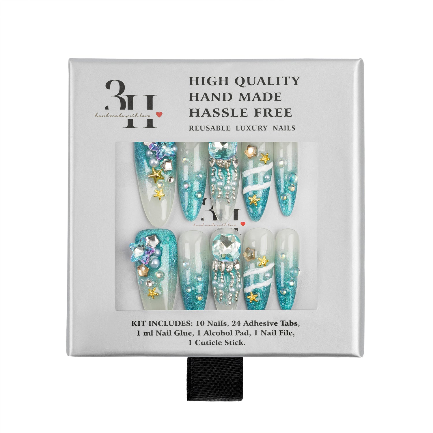 A 10-piece press-on nail kit in its original white packaging, featuring light blue, white, and clear acrylic nails decorated with rhinestones, gold foil stars, and floral designs.