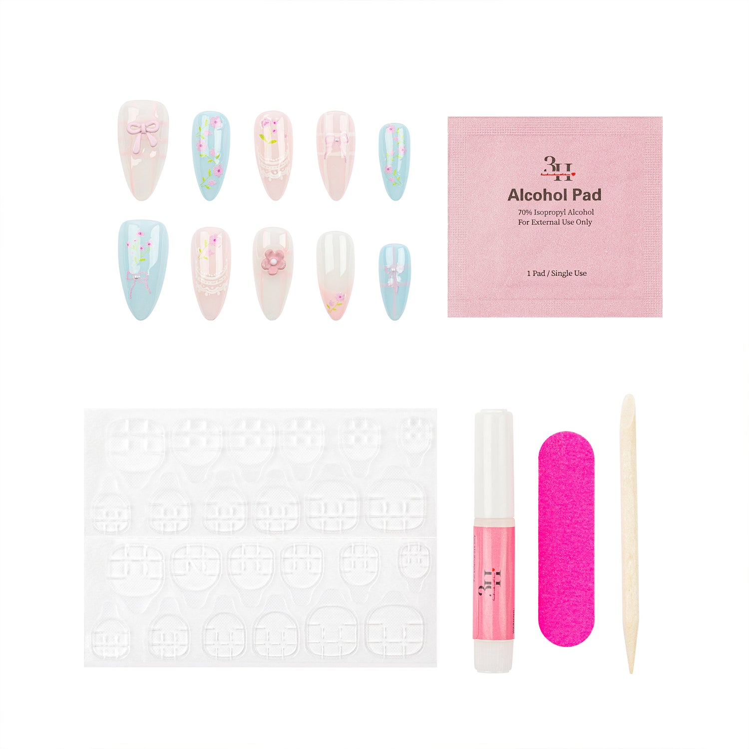 Nail art kit with 10 decorated false nails, a pink packet labeled 'Alcohol Pad', a white nail file, a pink nail file, a small pink tube, and a white wooden tool on a white background.