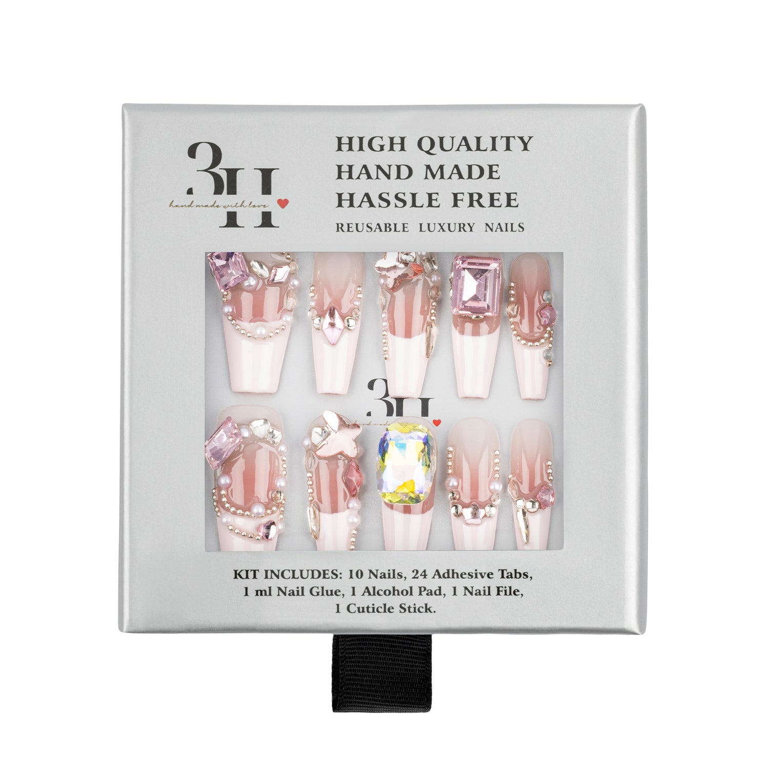 A boxed set of decorative press-on nails in a white package with a clear window showing ten long coffin-shaped nails in pink, nude, and embellished designs.