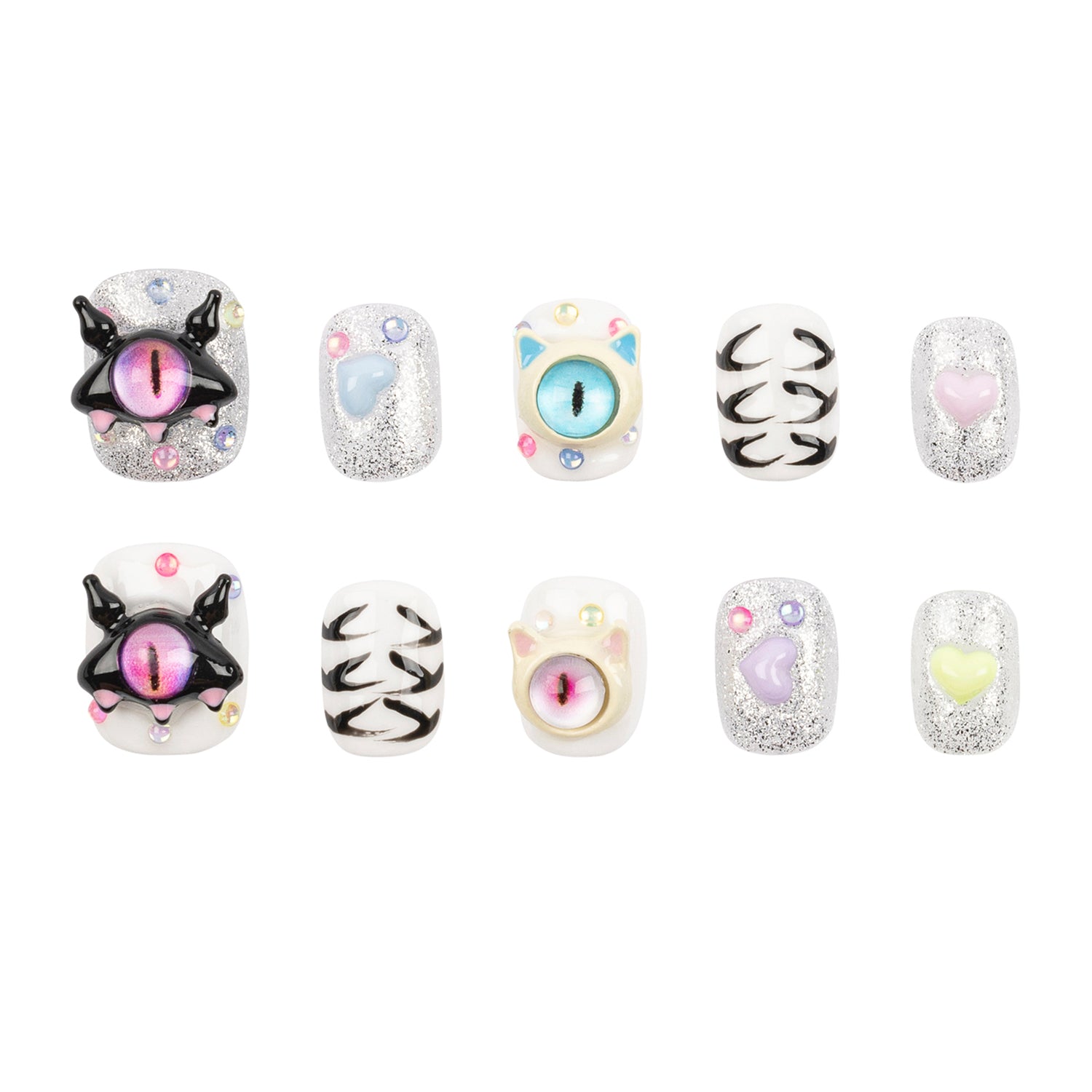 Ten decorative nail charms or bead-like accessories arranged in two rows on a plain white background. The set includes glittery silver pieces with pastel hearts and eyes, black-and-white cat-face designs, and pastel pink, blue, yellow, and lavender eye motifs.