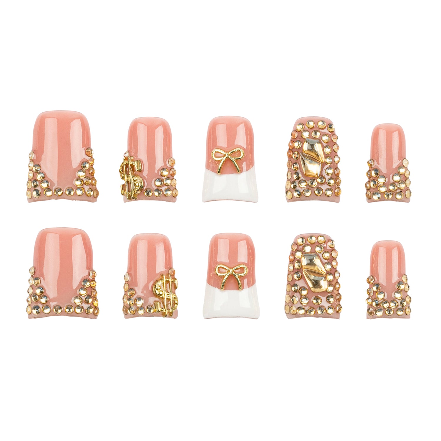 Ten false press-on nails arranged in two rows on a plain white background. The nails feature a glossy light pink top half, a white bottom half on three nails, and ornate gold embellishments including rhinestones, dollar sign charms, and bow details.
