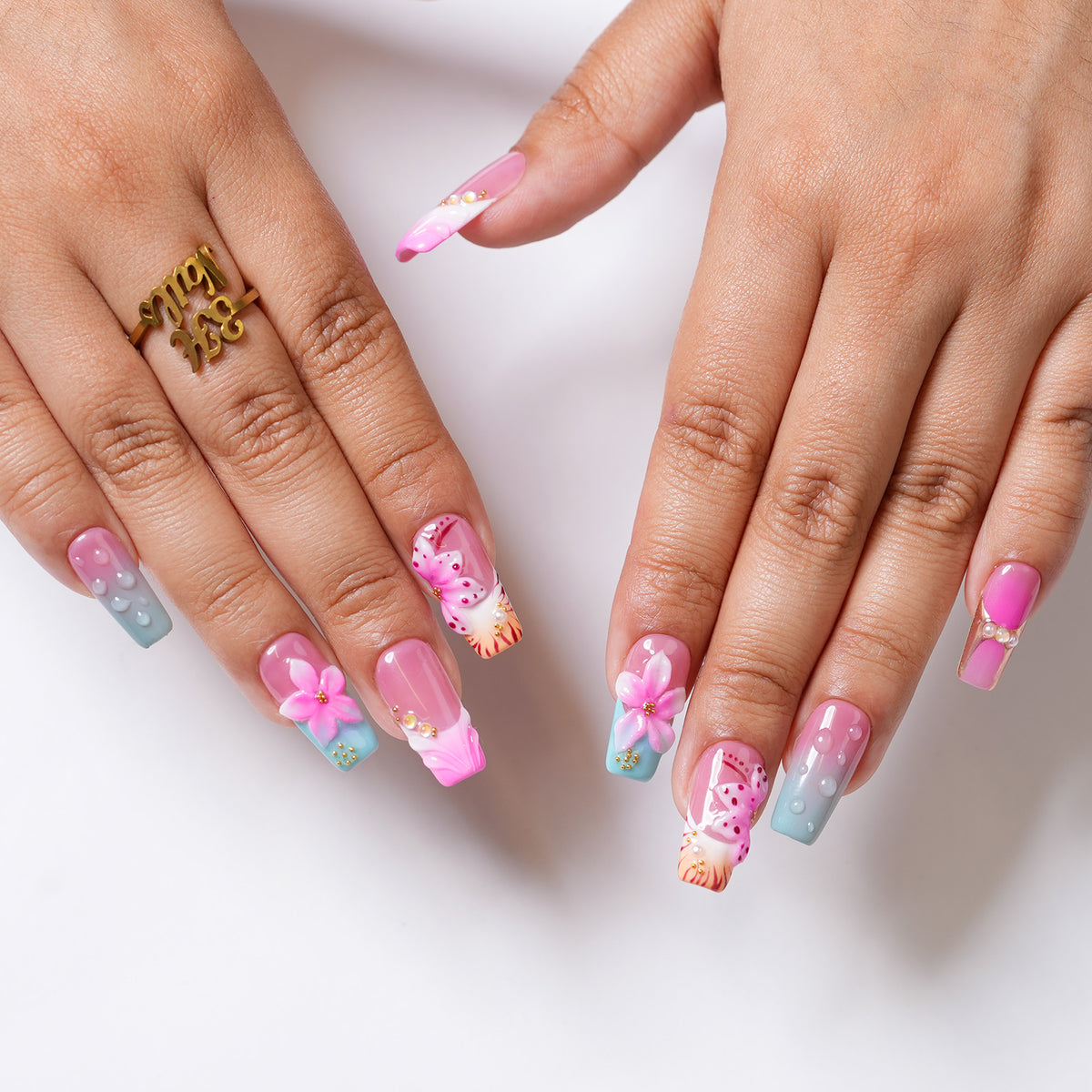 Long square press-on nails with tropical floral design by 3H Nails, showcasing vibrant, colorful tropical bloom patterns.