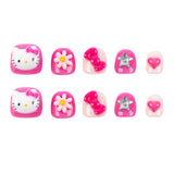 A set of ten pink and white decorative nail stickers arranged in two rows on a plain white background. The designs include Hello Kitty faces, white daisy flowers with yellow centers, pink bows, a silver star, and pink hearts.