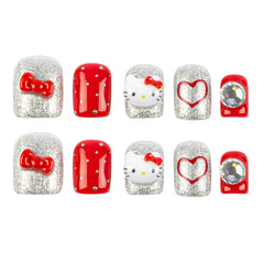 A set of ten press-on nails arranged in two rows of five on a plain white background. The designs include silver glitter with red bows, red glossy with small silver dots, a white Hello Kitty face with a red bow, a silver glitter heart outline, and a red heart outline with a clear rhinestone.