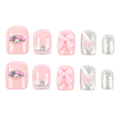A set of 10 press-on nails arranged in two rows of five on a plain white background. The set features a mix of pastel pink and glittery silver designs, including solid pink, pink bows, pink My Melody cartoon character prints, and pink heart patterns with silver glitter.
