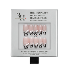 Medium coffin press-on nails with leopard print design by 3H Nails, showcasing a stylish, glossy finish in a box.