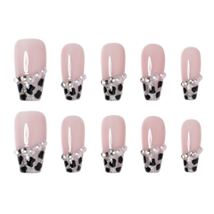 Leopard Luxe medium coffin press-on nails from 3H Nails with a bold leopard print design.