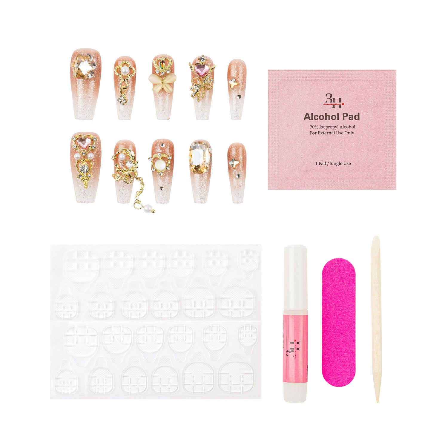 Nail art kit with decorative false nails, a pink alcohol pad packet, a white nail stamping plate, a pink nail file, a pink nail polish tube, and a wooden cuticle stick on a white background.