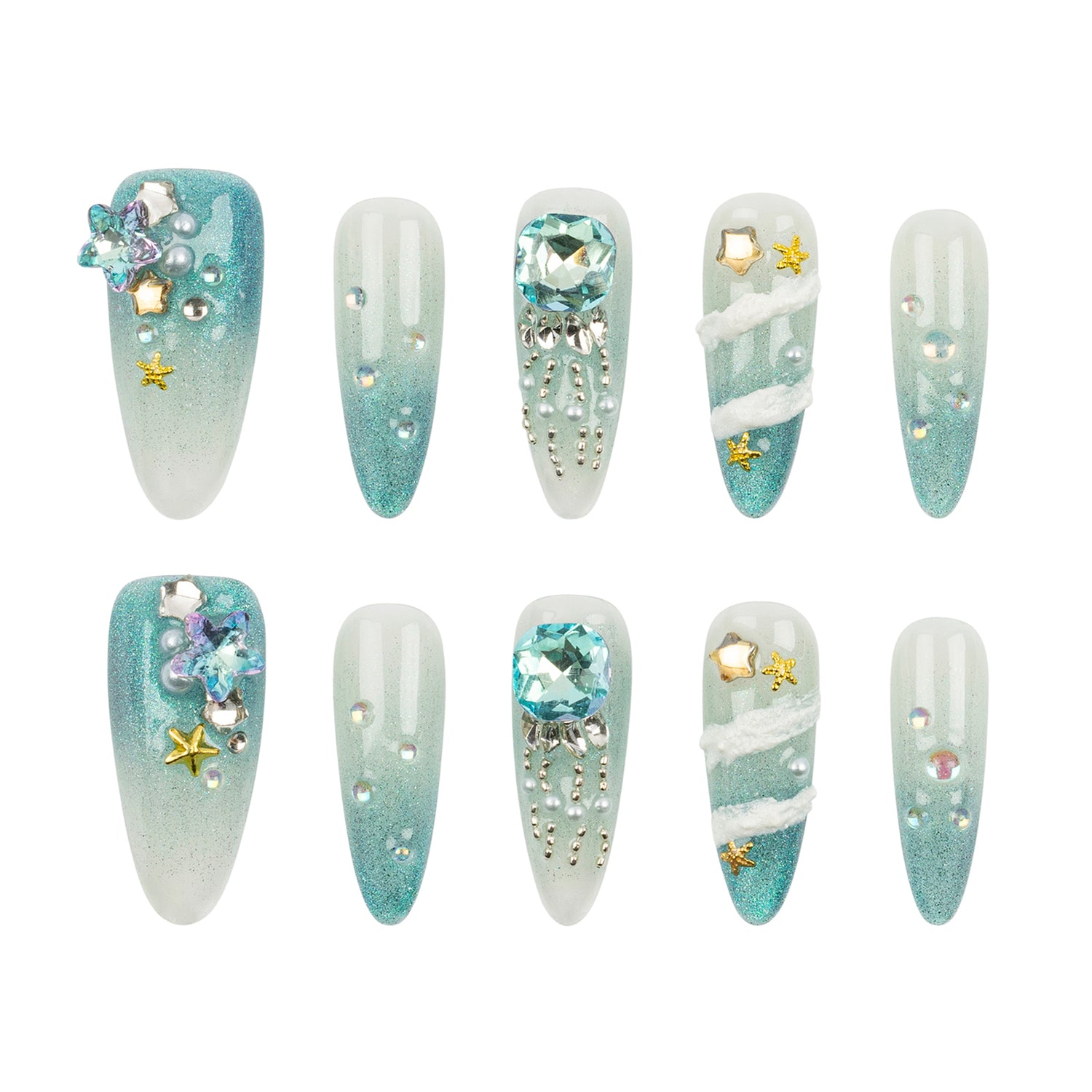 Set of ten artificial press-on nails arranged in two rows of five on a plain white background. The nails feature a light blue to white gradient with various embellishments including rhinestones, pearls, silver beads, and gold star accents.