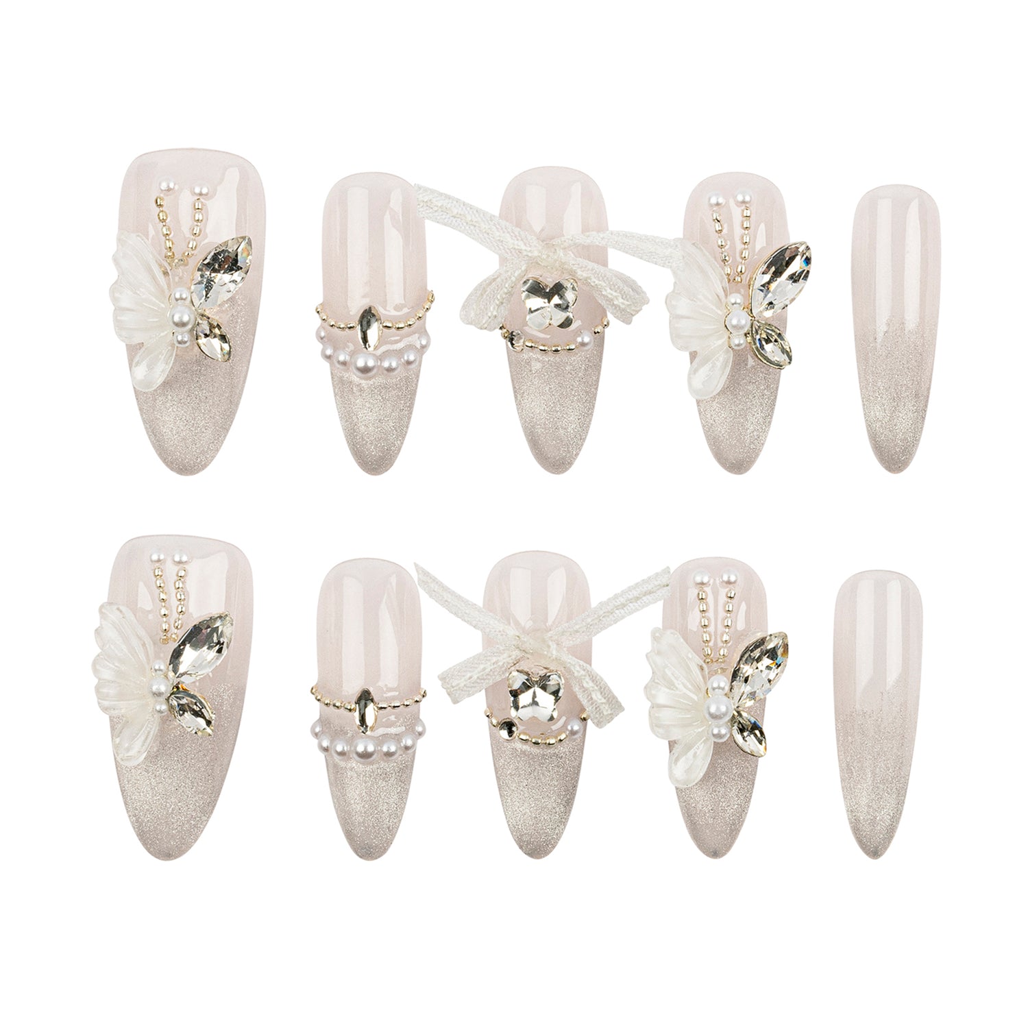 A set of 12 false press-on nails arranged in two rows on a plain white background. The nails feature a glossy nude-pink base with glittery silver tips, embellished with white fabric flowers, clear rhinestones, pearl-like beads, and small butterfly decorations.