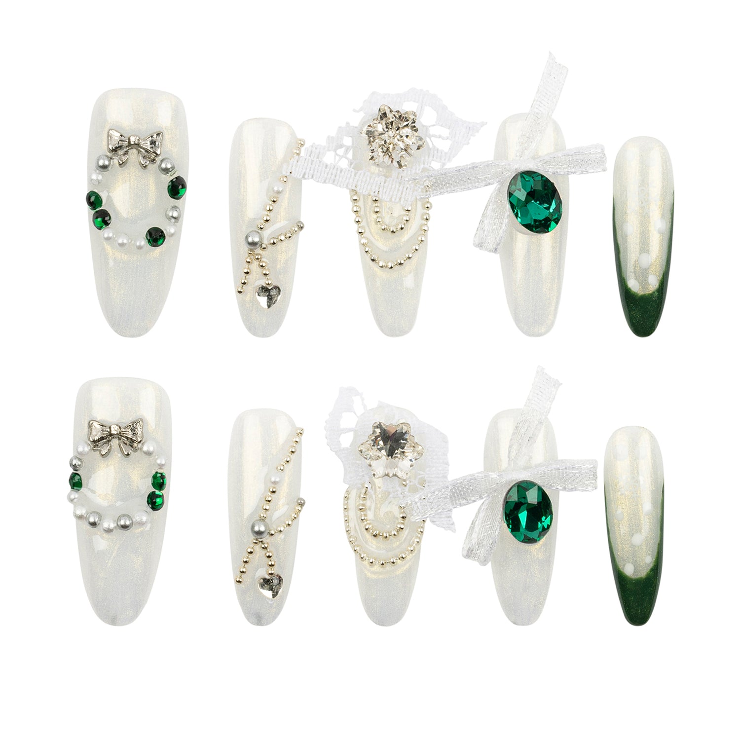 Eight decorative false press-on nails arranged in two rows on a plain white background. The nails are primarily glossy white with embellishments including green gemstones, silver rhinestones, bows, lace, and dark green gradient tips on some pieces.