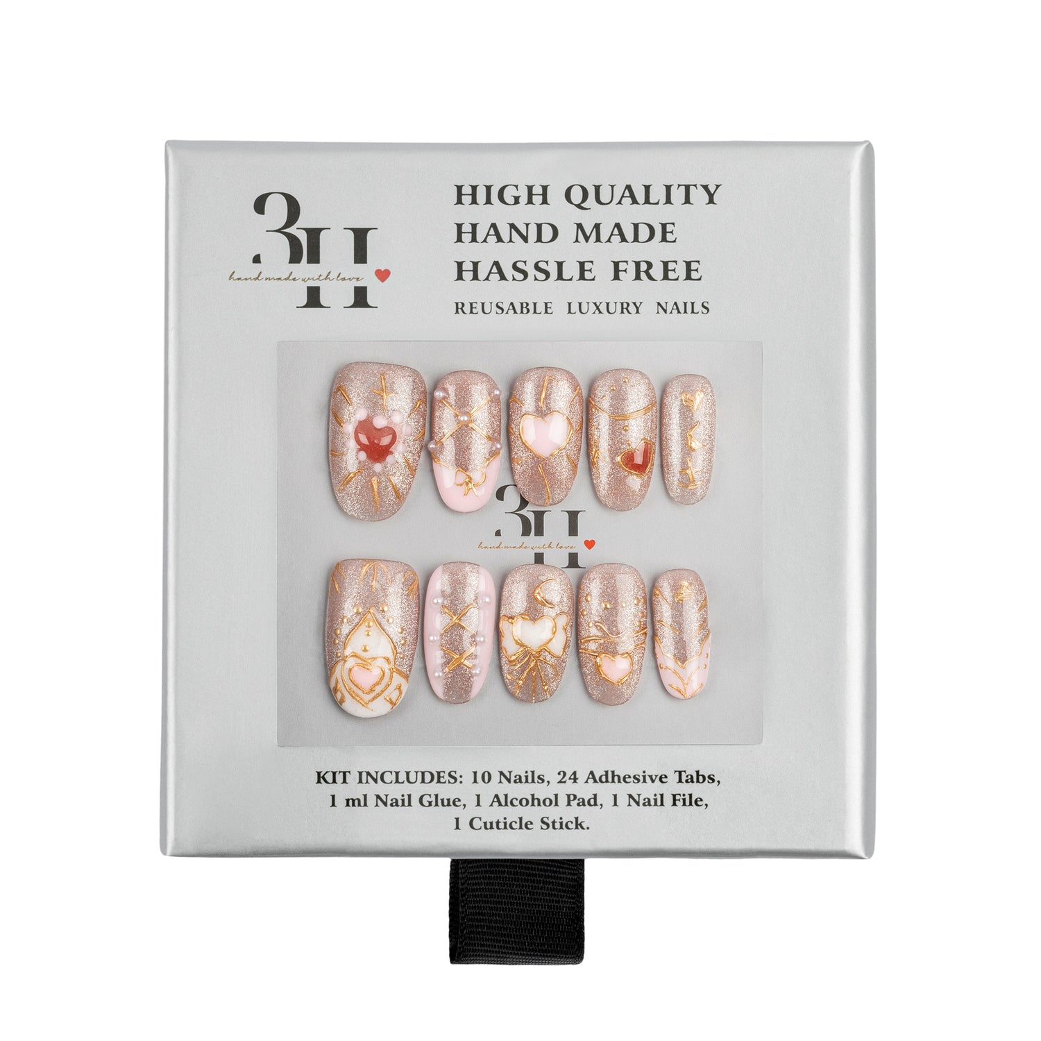 A 10-piece reusable press-on nail kit in its original packaging, featuring metallic rose gold and beige nails with gold glitter patterns and red heart details. 