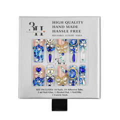 A boxed set of reusable luxury press-on nails by 3H Handmade, featuring blue, silver, and gold rhinestone designs on a white background.