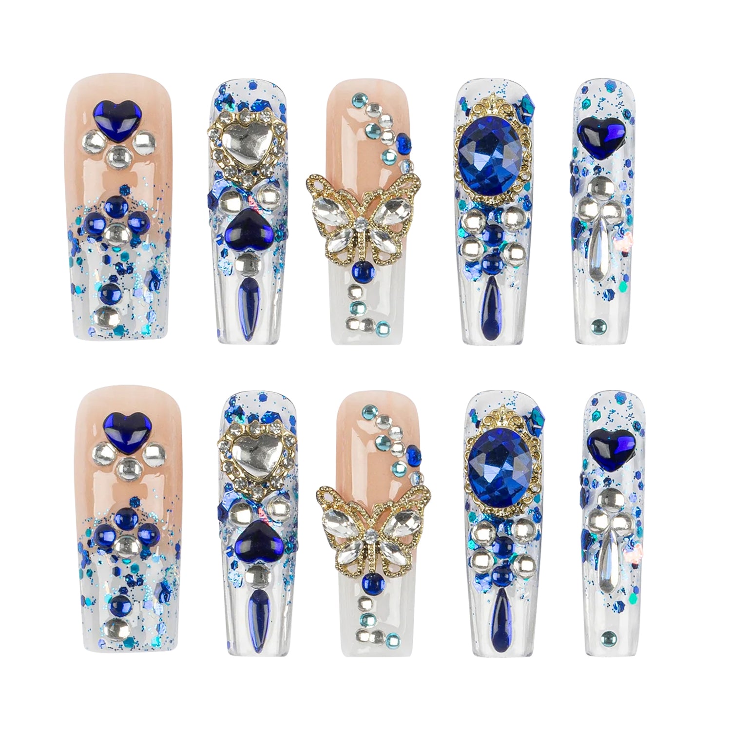 Ten decorative false press-on nails arranged in two rows of five on a plain white background. The nails feature embellished designs including blue gemstones, rhinestones, glitter, butterflies, and metallic details, with some nails showing a nude pink base and others being clear with white and blue embellishments.