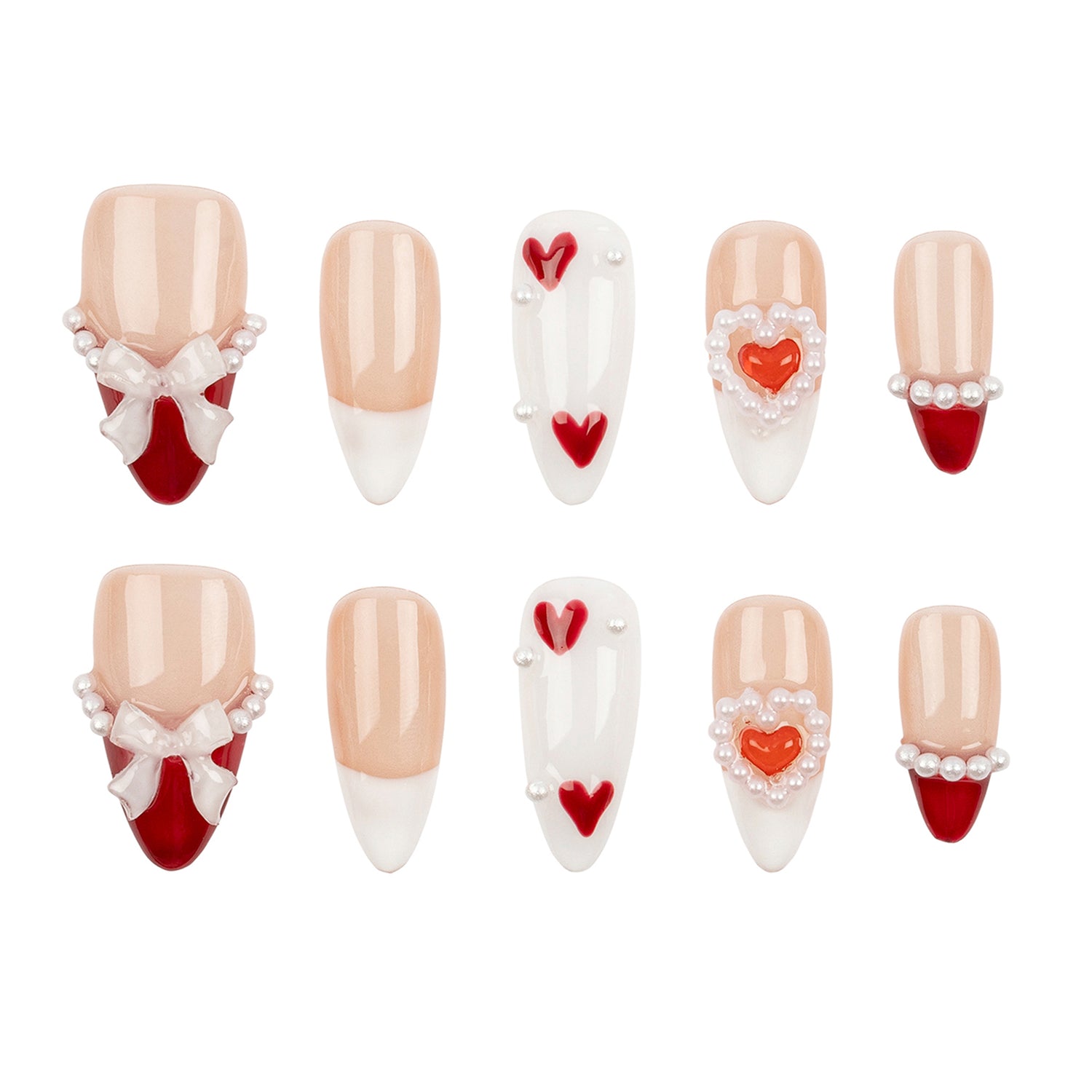 A set of ten false press-on nails arranged in two rows on a plain white background. The nails feature a mix of nude beige, white, red, and pearl embellishments, including heart and bow designs.