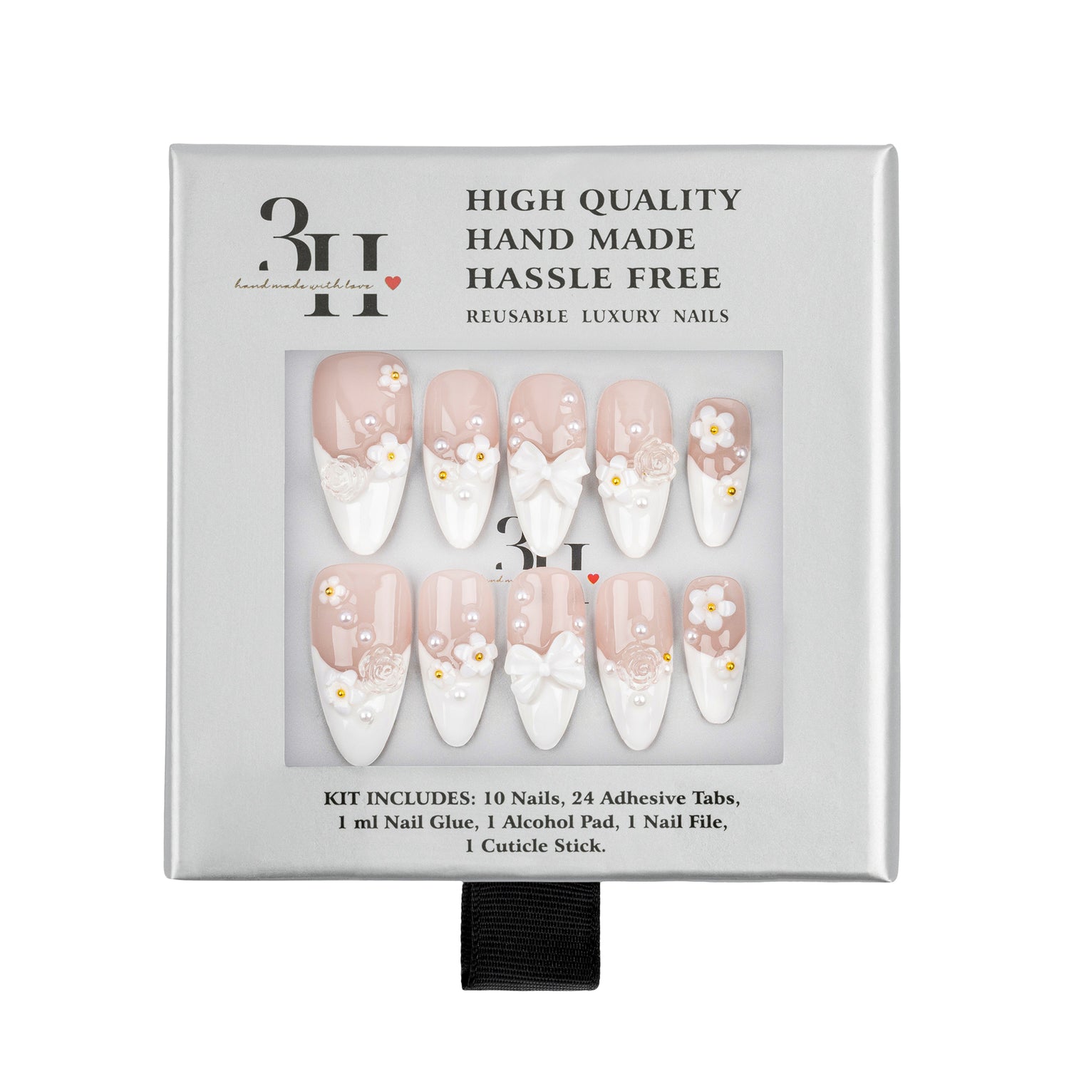 A boxed set of reusable press-on nails on a white background. The package shows ten almond-shaped nails with a pale blush pink base, white French tips, small white daisy motifs, and white bow designs.