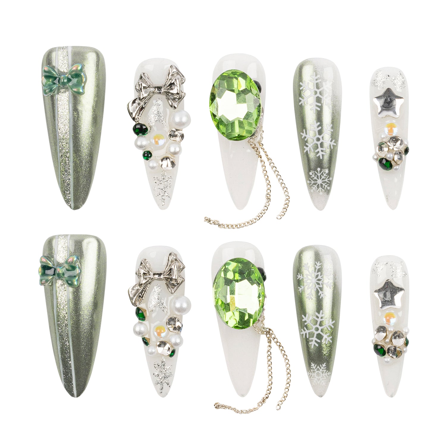 Eight artificial nail tips arranged in two rows on a white background, decorated with silver glitter, white snowflakes, bows, pearls, green gems, and star-shaped rhinestones.