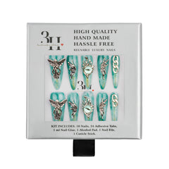 A 10-piece set of decorative press-on nails in a mint green and silver colorway, presented in a white retail box with product details printed on the front.