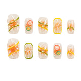 Handmade 3H Luxury Press-on Nails in style 1565, featuring stylish, yellow and orange citrus designs.