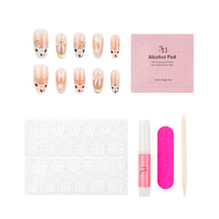 Nail art kit with decorative false nails, a pink alcohol pad packet, adhesive tabs, a pink nail file, a pink nail glue tube, and a wooden cuticle stick on a white background.