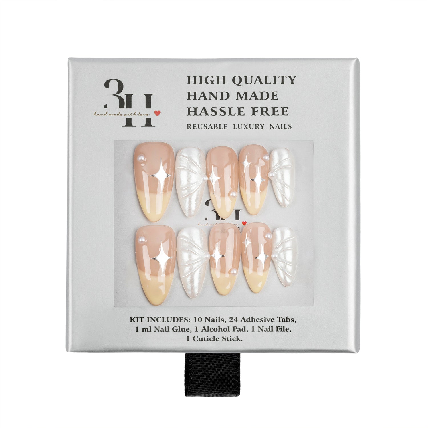 A 3H brand press-on nail kit in its original packaging, featuring 10 nude-beige and 10 white wing-patterned reusable luxury nails.