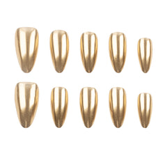 Ten metallic gold artificial press-on nails arranged in two rows of five on a plain white background.