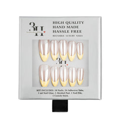 A 10-piece set of reusable press-on nails in a silver-gray retail box. The nails have a pearlescent, metallic champagne finish with a pale yellow French tip.