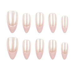 Ten false press-on nails arranged in two rows on a plain white background. The nails have a glossy pearlescent finish with a soft pink base and a warm champagne-ivory top half.