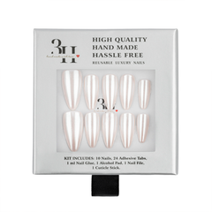 A 3H brand press-on nail kit in its original packaging, featuring 10 glossy, pearlescent almond-shaped nails with 24 adhesive tabs, a nail glue bottle, a cuticle stick, and an alcohol pad visible through a clear window on the front of the gray box.