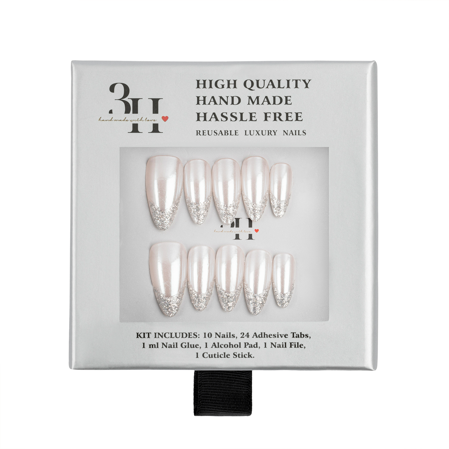 A 10-piece press-on nail kit in its original packaging, featuring glossy white almond-shaped nails with silver glitter tips. The packaging is gray with black text and a clear window displaying the nails.