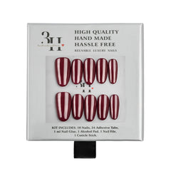 A 10-piece press-on nail kit in its original packaging, featuring burgundy and white vertical stripes on the nails. The packaging is white with black text and a clear window displaying the nails.