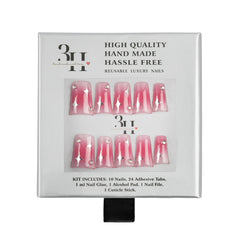A 10-piece set of reusable press-on nails in a pink ombre gradient with silver star and diamond designs, presented in a white cardboard packaging box with black text.