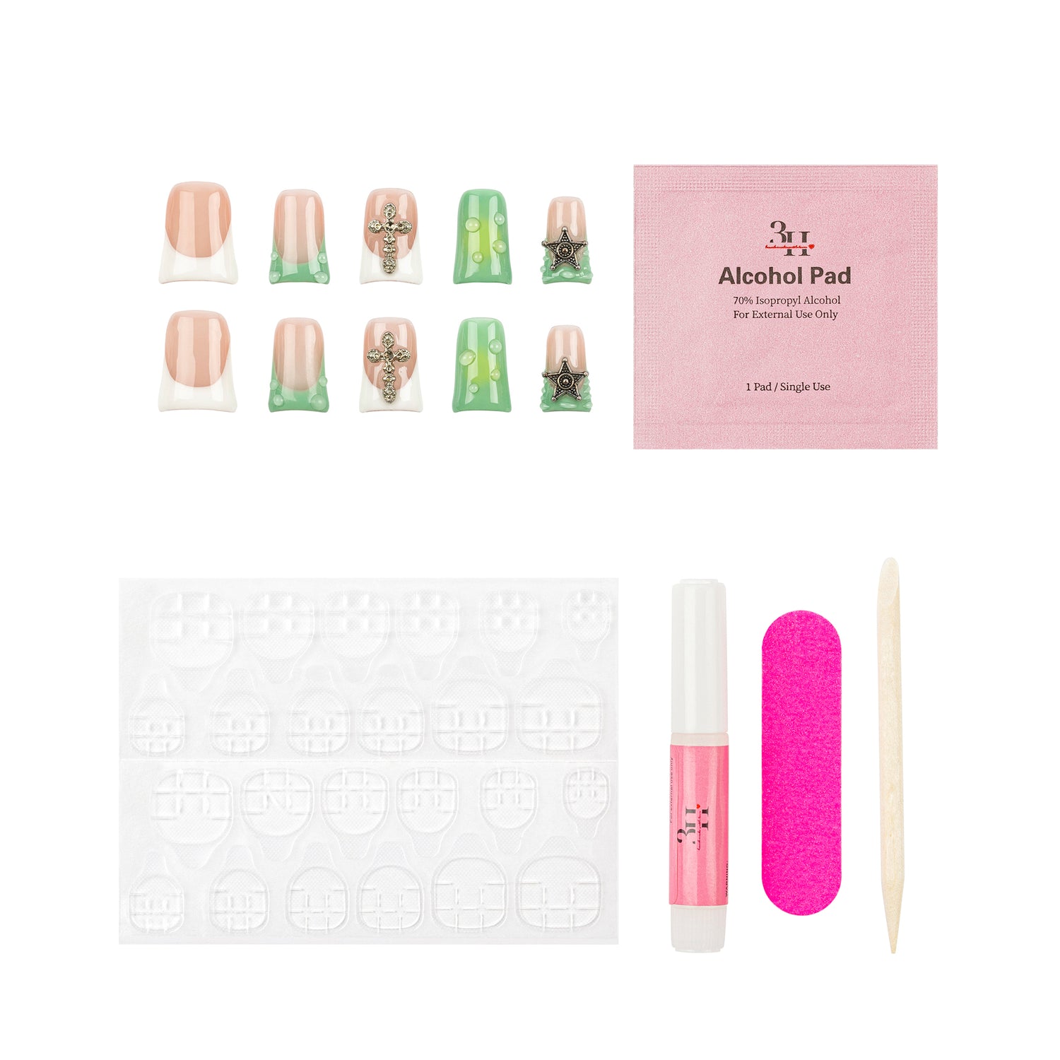 Nail art kit with a set of false nails, a pink packet of alcohol pads, adhesive tabs, a pink nail file, a pink nail glue tube, and a wooden cuticle stick on a white background.