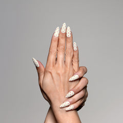 Hand model showing 3H Nails Luxury Handmade Press-on Nails in Flamingo Pop design on natural nails.