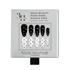 Set of black and white nail art with packaging on a white background