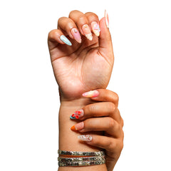 Maui medium almond press-on nails by 3H Nails, featuring coral, aqua, peach, and pink tones with tropical florals, pearls, ombre, and metallic accents, shown on hands.