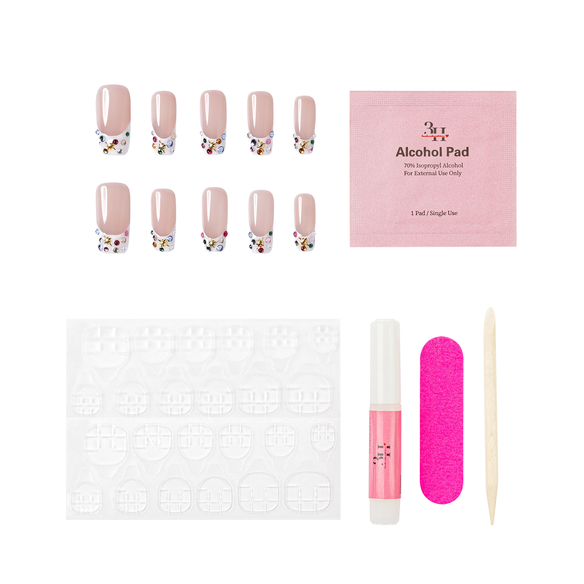Las Vegas medium square press-on nails by 3H Nails, featuring a nude base with white French tips, multicolor rhinestones, and gold star accents, shown with the included application kit.