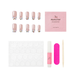 Las Vegas medium square press-on nails by 3H Nails, featuring a nude base with white French tips, multicolor rhinestones, and gold star accents, shown with the included application kit.