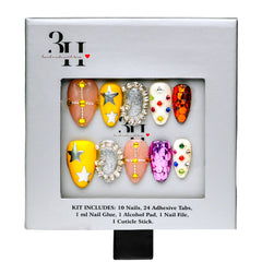 New Orleans medium almond press-on nails by 3H Nails, featuring jewel-tone gems, metallic stars, crystal accents, and reflective multicolor details, displayed in 3H Nails packaging.