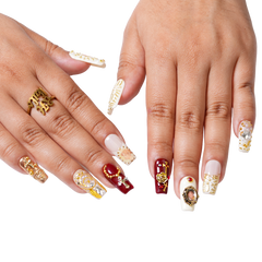 Gilded Relic long square press-on nails featuring glossy burgundy, ivory and gold tones with raised vintage-inspired embellishments.