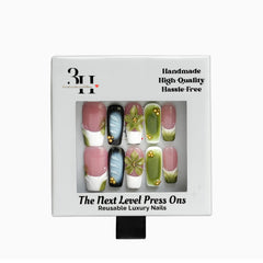 Orchid Dreams retail packaging showing the 3H Nails long square floral press-on nail set.