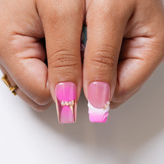 Long square press-on nails with tropical floral design by 3H Nails, featuring colorful blooming flower patterns.