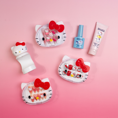 Hello Kitty manicure bundle with three 3D nail sets and application essentials