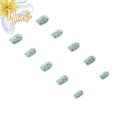 Handmade 3H Nails luxury press-on nails in Poppy design, showcasing vibrant, stylish nail tips with a glossy finish.